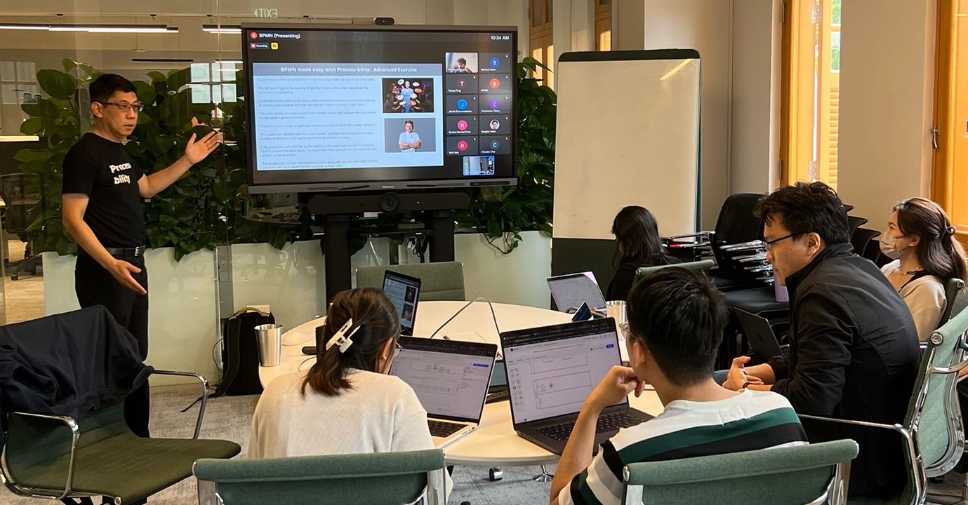 Kevin Tan delivering the Process-bility BPMN masterclass, an advanced exercise, to the team at Flo Energy